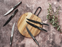 Planche à découper en bois d'acacia STINE - Ø26cm